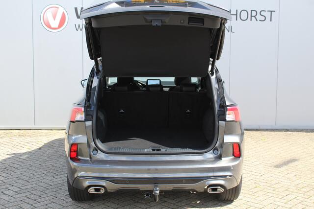 Ford KUGA 2.5-225pk PHEV Vignale. In uiterst nette staat verkerende Ford Kuga in de zeer chique Vignale uitvoering met slechts 23.000km ! Adapt. cruise cntrl, side- en lane assist, trekhaak, head-up display, B&O soundsyst., lederen int., stuur-, stoel-, achterbank- en voorraamverw. etc.