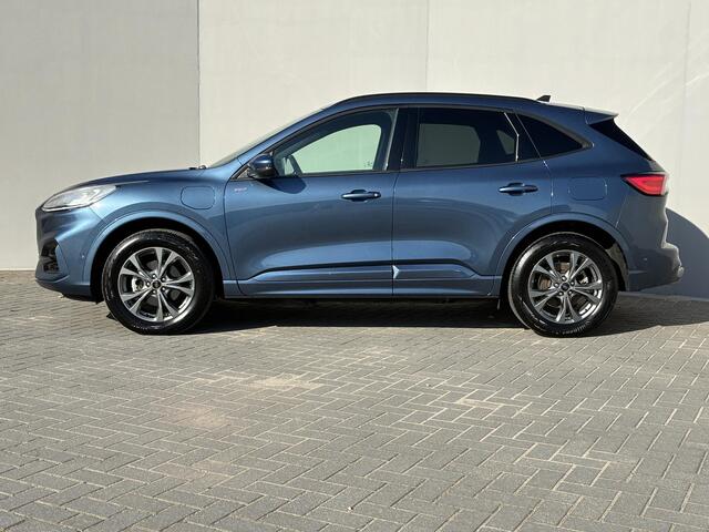 Ford KUGA 2.5 PHEV ST-Line X / Dealer onderhouden / Trekgewicht 1.500 kg / Navigatie / Stuur-, stoel- & achterbankverwarming / Parkeer assistent / Camera 360° / Elektrische stoel & klep / 18" LM wielen / Adaptief cruise control / Apple Carplay/Android Auto /