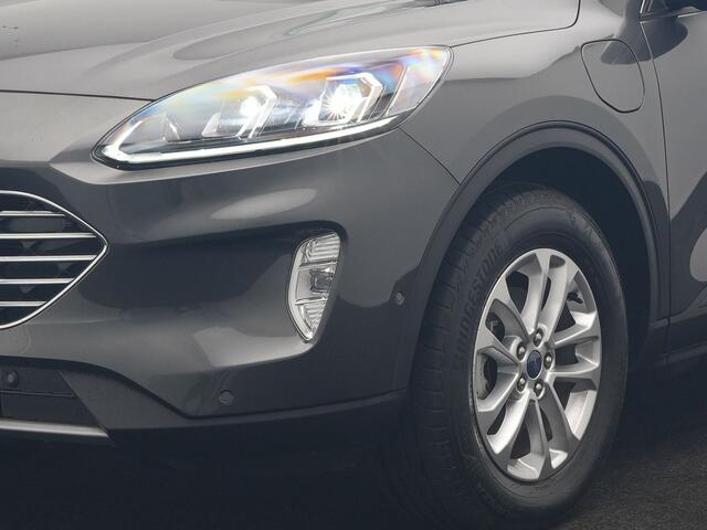 Ford KUGA 2.5 Titanium X PHEV 225pk Dealer O.H | Trekhaak Af Fabriek | Panodak | Adaptive Cruise | 360 Camera | Head Up | Bang & Olufsen | Sportstoelen & Stuur Verwarmd | Apple Carplay | Keyless | Pilot Assist | Virtual | Navigatie | DAB | 17" L.M | Plug In Hybrid |