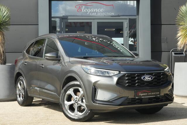 Ford KUGA 2.5 PHEV ST-Line | 243PK | Winterpakket | ACC | Camera | 2100KG | Kortom: een zeer complete, krachtige en moderne Kuga ST-Line met slechts 15 km, 243 pk, plug-in hybride techniek en maar liefst 2.100 kg trekgewicht. Een bijzonder interessante combinatie van