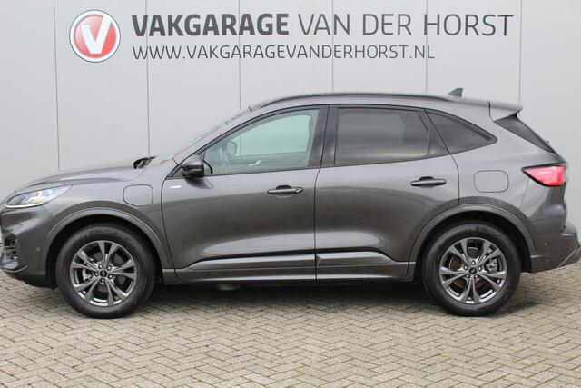 Ford KUGA 2.5-225pk PHEV ST-Line X. Hybride rijden voor een reëel bedrag ! Autm. airco dual, adapt. cruise control, navigatie, LED verl., telefoonvoorb., lane- en side assist, elektr. achterklep, B&O soundsyst., camera v+a, stoel- en voorraamverw. etc.