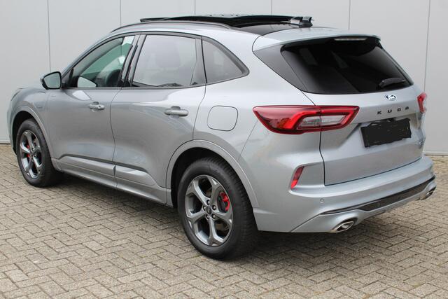Ford KUGA 2.5-243pk PHEV ST-Line X. Febr. 2026, slechts 14.000km ! Autm. airco dual, elektr. panodak, elektr. trekhaak, elektr. achterklep, leer/alcantara, klep, LED verl., navigatie, telefoonvoorb., stoel-, stuur-, voorraam- en achterbankverw., side- en lan