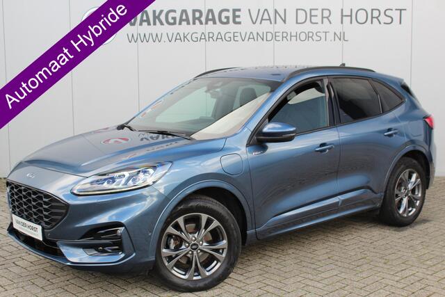Ford KUGA 2.5-225pk PHEV ST-Line X. Trekhaak ! Hybride rijden voor een reëel bedrag ! Trekhaak+afneembare kogel, autm. airco, adaptieve cruise control, camera v+a, B&O soundsystem, stoel-, stuur-, voorraam- en achterbank verwarming, lane- en side assist, etc