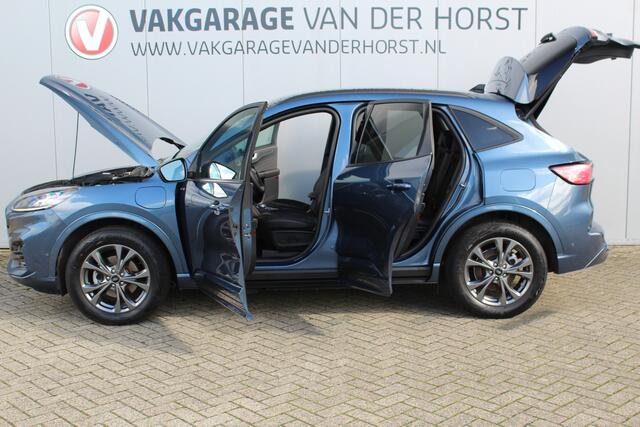 Ford KUGA 2.5-225pk PHEV ST-Line X. Trekhaak ! Hybride rijden voor een reëel bedrag ! Trekhaak+afneembare kogel, autm. airco, adaptieve cruise control, camera v+a, B&O soundsystem, stoel-, stuur-, voorraam- en achterbank verwarming, lane- en side assist, etc