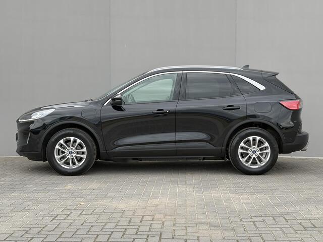 Ford KUGA 2.5 PHEV Titanium / Dealer Onderhouden / Trekgewicht 1.500 KG / Stoelverwarming / Verwarmde Voorruit / Navigatie / Elektrische Achterklep / Apple Carplay/Android Auto / Camera / Dual-Zone Climate Control / B&O Audio / Keyless Entry & Start /
