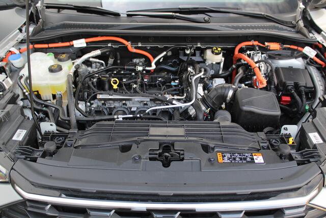 Ford KUGA 2.5 243 pk PHEV ST-Line X Maart 2026, slechts 9.800km ! Autm. airco dual, elektr. panodak, elektr. achterklep, leer/alcantara, klep, LED verl., navigatie, telefoonvoorb., stoel-, stuur-, voorraam- en achterbankverw., side- en lan – foto 7