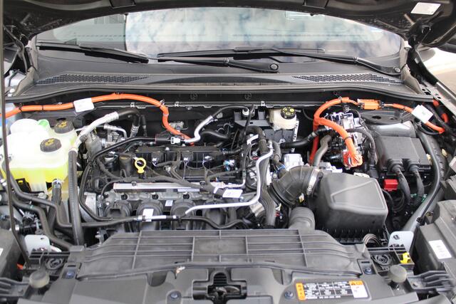 Ford KUGA 2.5 243 pk PHEV ST-Line X Febr. 2026, slechts 4.300km ! Autm. airco dual, elekt. achterklep, leer/alcantara, LED verl., navigatie, telefoonvoorb., stoel-, stuur-, voorraam- en achterbankverw., side- en lan – foto 7