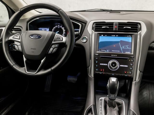 Ford MONDEO Wagon 2.0 IVCT HEV Titanium 191Pk Automaat (APPLE CARPLAY, GROOT NAVI, CAMERA, STOELVERWARMING, ELEK SPORTSTOELEN, TREKHAAK, GETINT GLAS, ADAPTIVE CRUISE, NIEUWE APK, NIEUWSTAAT)