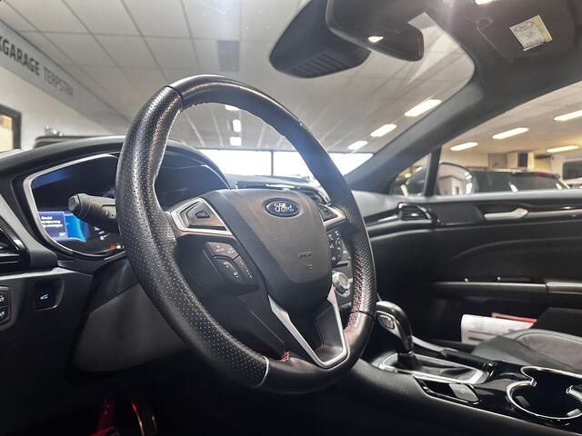 Ford MONDEO Wagon 2.0 IVCT HEV ST-Line/ Dealer Onderhouden!/ Automaat/ Zwarte Hemel/ Camera/ Elek.Klep/ Stoel+Voorruitverw./ Elek.Stoel+Memory/ 18''LMV/ LED Koplampen/ Keyless/ Dodehoekdet./ Apple+Android/ Clima/ Navi/ Cruise/ PDC.