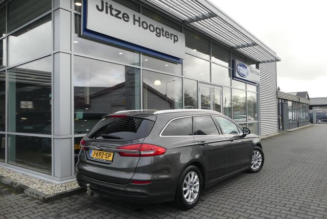 Ford MONDEO Wagon 2.0 IVCT HEV Titanium ELEKT. TREKHAAK (750KG), WINTER PACK, MEMORY, CRUISE, CLIMA, NAVI, CAMERA, PDC V&A, APPLE CARPLAY/ANDROID AUTO, BLIS, KEYLESS, ELEKT. PASSAGIERSSTOEL, ELEKT. ACHTERKLEP, ADAPTIEVE KOPLAMPEN, LANE ASSIST, 57.812KM