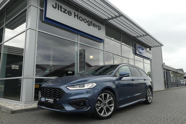 Ford MONDEO Wagon 2.0 IVCT HEV ST-Line WINTER PACK, MEMORY, ADAPT. CRUISE, CLIMA, NAVI, CAMERA, PDC V&A, APPLE CARPLAY/ANDROID AUTO, BLIS, KEYLESS, ELEKT. ACHTERKLEP, ELEKT. PASSAGIERSSTOEL, 54.035KM