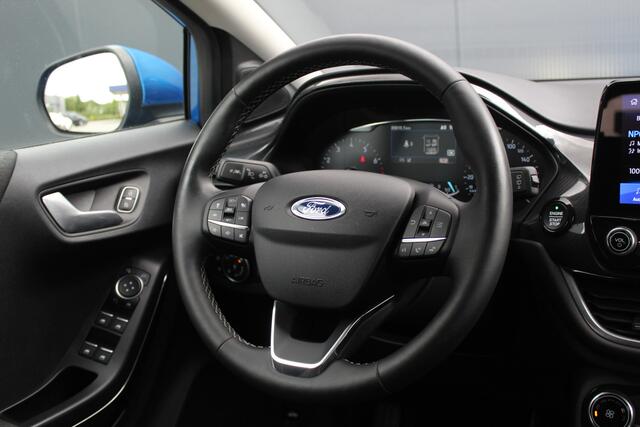 Ford PUMA 1.0 EcoBoost Titanium | Incl. 12 maanden garantie | Trekhaak | Dodehoek detectie | Cruise control | Apple Carplay/Android auto | Lichtmetalen velgen | Elektrische kofferklep | DAB | Airco | Climate control | Navigatie