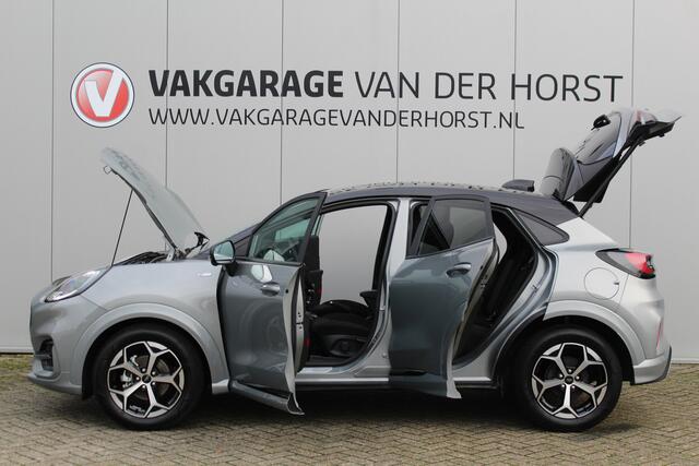 Ford PUMA 1.0-125pk EcoBoost Mild-Hybrid ST-Line, two-tone. Alwéér een prachtige hoogzitter met slechts 9.400km ! Autm. airco, camera 360gr., LM wln, side- en lane assist, adaptieve cruise cntrl, navigatie, telefoonvoorb., stoel-, stuur-- en voorraamverw. etc.