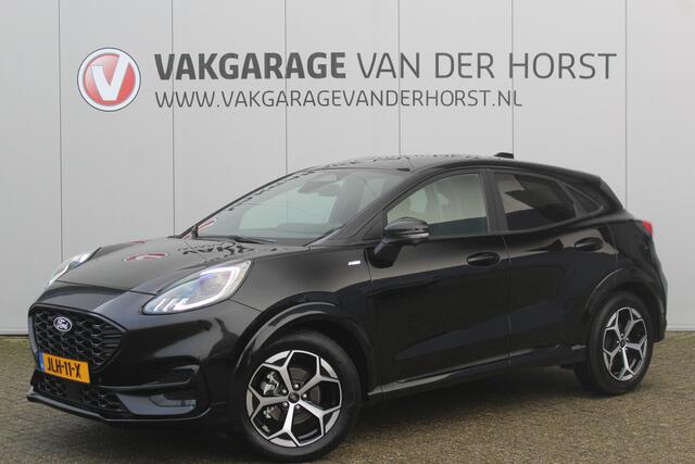 Ford PUMA 1.0-125pk EcoBoost Mild-Hybrid ST-Line. Mooie luxe hoogzitter ! Slechts 12.200km ! Autm. airco, adapt. cruise control, stoel-, stuur- en voorraamverw., navigatie, telefoonvoorb., LM wielen, elektr. achterklep, LED verl., camera, pdc v+a etc.