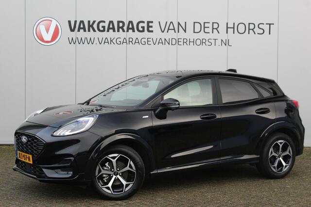 Ford PUMA 1.0-125pk EcoBoost Mild-Hybrid ST-Line. Mooie luxe hoogzitter ! Slechts 9.950km ! Autm. airco, adapt. cruise control, stoel-, stuur- en voorraamverw., navigatie, telefoonvoorb., LM wielen, elektr. achterklep, LED verl., camera, pdc v+a etc.