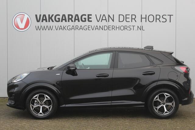 Ford PUMA 1.0-125pk EcoBoost Mild-Hybrid ST-Line. Mooie luxe hoogzitter ! Slechts 9.950km ! Autm. airco, adapt. cruise control, stoel-, stuur- en voorraamverw., navigatie, telefoonvoorb., LM wielen, elektr. achterklep, LED verl., camera, pdc v+a etc.