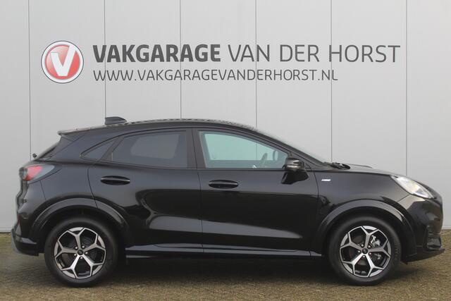 Ford PUMA 1.0-125pk EcoBoost Mild-Hybrid ST-Line. Mooie luxe hoogzitter ! Slechts 9.950km ! Autm. airco, adapt. cruise control, stoel-, stuur- en voorraamverw., navigatie, telefoonvoorb., LM wielen, elektr. achterklep, LED verl., camera, pdc v+a etc.