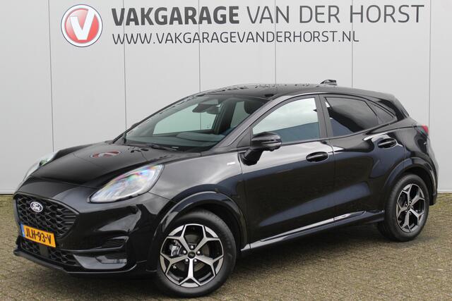 Ford PUMA 1.0-125pk EcoBoost Mild-Hybrid ST-Line. Mooie luxe hoogzitter ! Slechts 8.960km ! Autm. airco, adapt. cruise control, stoel-, stuur- en voorraamverw., navigatie, telefoonvoorb., LM wielen, elektr. achterklep, LED verl., camera 360gr, pdc v+a etc.