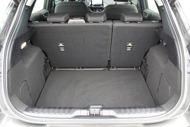 Ford PUMA 1.0-125pk EcoBoost Mild-Hybrid Titanium. Fabrieksgarantie t/m 21-05-2027 ! Slechts 14.800km ! Volautm. airco, pdc achter, all season banden, stoel-, stuur- en voorraamverw., navigatie, telefoonvoorb., elektr. achterklep, cruise cntrl, keyless entry&go etc