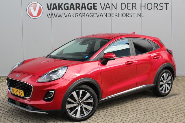 Ford PUMA 1.0-125pk EcoBoost Mild-Hybrid Titanium X. Mooie, chique en luxe Ford Puma, hoge in- en uitstap ! Autm. airco, adapt. cruise cntrl, side- en lane assist, stoel-, stuur- en voorraamverw., navigatie, telefoonvoorb., all season banden, LED verl., B&O soundsyst. etc.