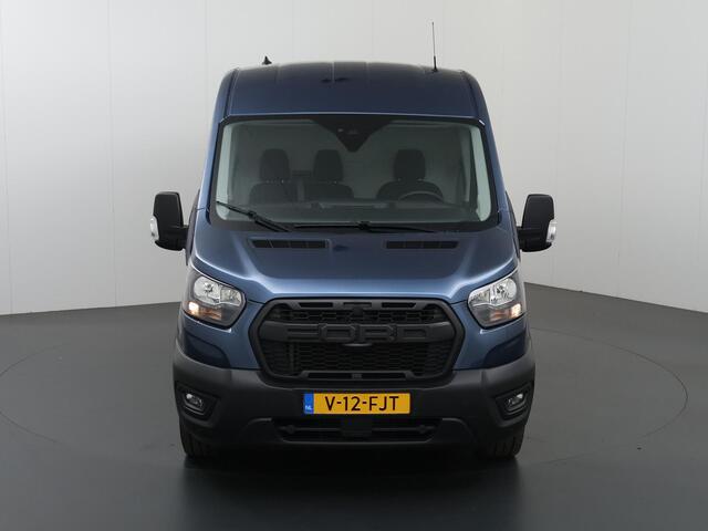 Ford TRANSIT 330 | 2.0 TDCI | L2 H2 | TREND | 170 PK | STOELVERWARMING | RAPTOR GRILLE | TRAIL VELGEN | PARKEERSENSOREN | TREKHAAK | DAB + | AIRCO | CRUISE CONTROL | METALLIC | NL | DEALER ONDERHOUDEN