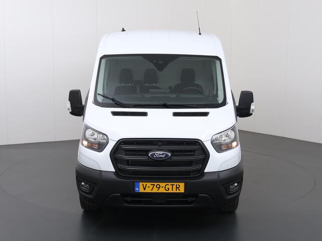 Ford TRANSIT 350 | 2.0 TDCI | L3 H2 | Trend | TREKHAAK 2500 KG AHW | CLIMATE CONTROL | NAVIGATIE | PARKEERSENSOREN V+A | CRUISE CONTROL | BIJRIJDERSBANK | LAADRUIMTE PAKKET | APPLE CARPLAY / ANDROID AUTO | STOEVERWARMING