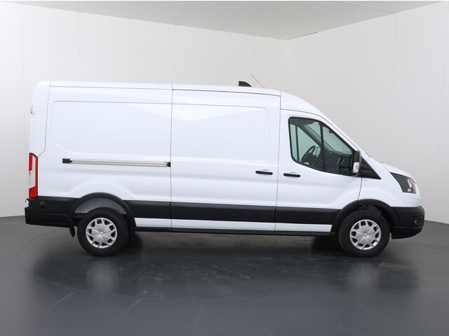 Ford TRANSIT 350 | 2.0 TDCI | L3 H2 | Trend | TREKHAAK 2500 KG AHW | CLIMATE CONTROL | NAVIGATIE | PARKEERSENSOREN V+A | CRUISE CONTROL | BIJRIJDERSBANK | LAADRUIMTE PAKKET | APPLE CARPLAY / ANDROID AUTO | STOEVERWARMING