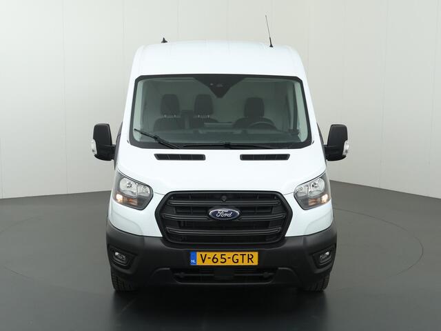 Ford TRANSIT 350 | 2.0 TDCI | L3 H2 | Trend | TREKHAAK 2500 KG AHW | CLIMATE CONTROL | NAVIGATIE | PARKEERSENSOREN V+A | CRUISE CONTROL | BIJRIJDERSBANK | LAADRUIMTE PAKKET | APPLE CARPLAY / ANDROID AUTO | STOEVERWARMING