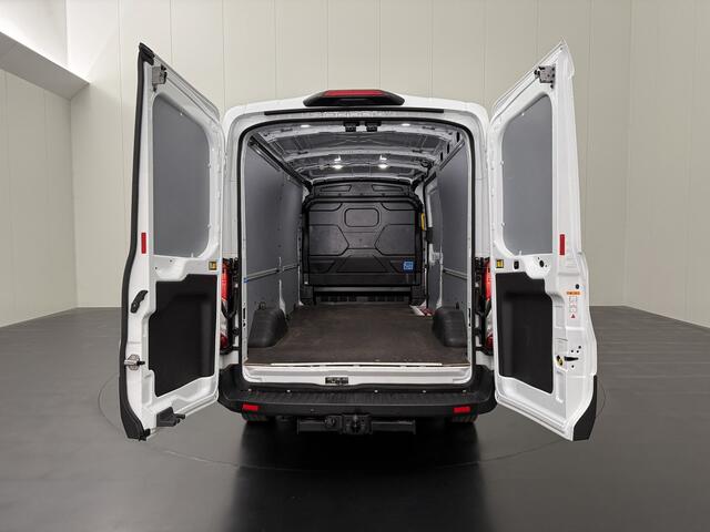 Ford TRANSIT 130PK L3H2 | Navigatie | Camera | Airco | Fabrieksgarantie | Cruise | Trekhaak | Betimmering | 3-Zits