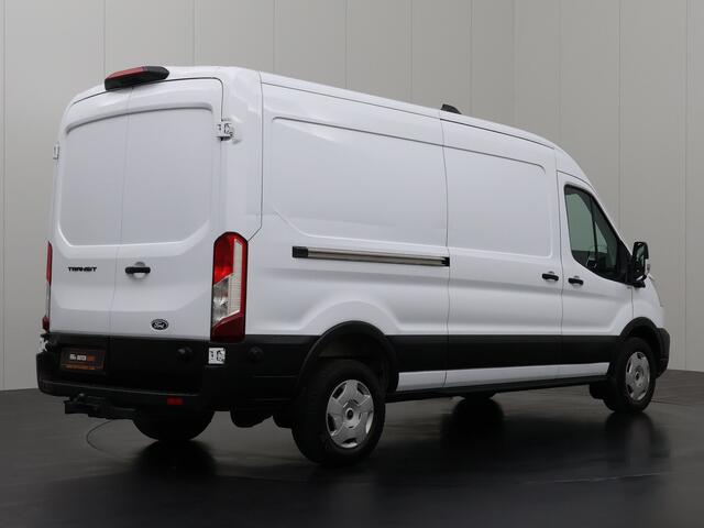 Ford TRANSIT 130PK L3H2 | Navigatie | Camera | Airco | Fabrieksgarantie | Cruise | Trekhaak | Betimmering | 3-Zits