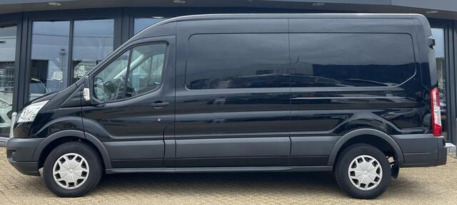 Ford TRANSIT 350 2.0 TDCI L3H2 Trend 131PK | 1e Eigenaar | NL AUTO | NAP | Trekhaak | Achteruitrijcamera | Parkeersensoren Voor en Achter | Airco | Cruise Control | Navigatie | Apple Carplay | Andriod Auto | Nieuwe APK | LETOP: Auto is in de laadruimte niet schoon en reclame stickers zijn nog zichtbaar |