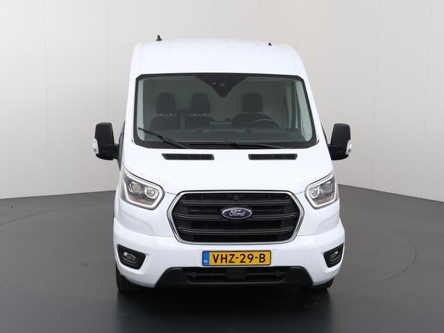 Ford TRANSIT 350 2.0 TDCI | L2 H2 | AUTOMAAT | LIMITED BI-XENON KOPLAMPEN | NAVIGATIE | STOELVERWARMING | ACHTERUITRIJCAMERA | TREKHAAK | BETIMMERDE LAADRUIMTE | ADAPTIEVE CRUISE CONTROL