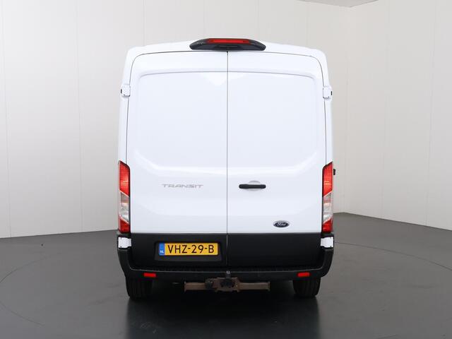 Ford TRANSIT 350 2.0 TDCI | L2 H2 | AUTOMAAT | LIMITED BI-XENON KOPLAMPEN | NAVIGATIE | STOELVERWARMING | ACHTERUITRIJCAMERA | TREKHAAK | BETIMMERDE LAADRUIMTE | ADAPTIEVE CRUISE CONTROL
