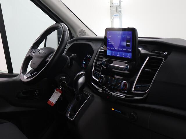 Ford TRANSIT 350 2.0 TDCI | L2 H2 | AUTOMAAT | LIMITED BI-XENON KOPLAMPEN | NAVIGATIE | STOELVERWARMING | ACHTERUITRIJCAMERA | TREKHAAK | BETIMMERDE LAADRUIMTE | ADAPTIEVE CRUISE CONTROL