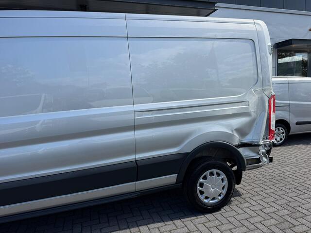 Ford TRANSIT 330 2.0 TDCI L3H2 Ambiente achterschade l airco l cruise l camera l trekhaak l MARGE