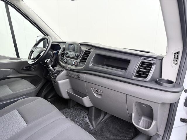 Ford TRANSIT 350 2.0TDCI 130PK Euro 6 L3H2 3-Persoons Camera Stoelverwarming Airco Cruise Control Bluetooth Pdc Voorruit verwarmbaar Wandbetimmering Schuifdeur Wifi Dealeronderhouden