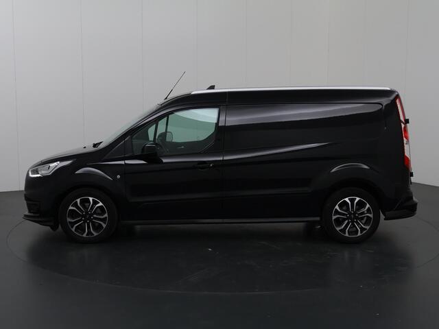 Ford TRANSIT CONNECT 1.5 ECOBLUE AUTOMAAT | L2 | SPORT | CAMERA | STOELVERWARMING | NAVIGATIE | CLIMATE CONTROL | BI-XENON LAMPEN | TREKHAAK | BETIMMERDE LAADRUIMTE | LICHTMETALEN WIELEN