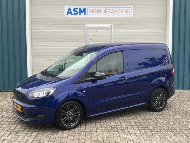 Ford TRANSIT COURIER 1.5 96Pk TDCI Sport / Cruise / Airco / Schuifdeur / Navi / Trekhaak / Lease ¤221,- pm / Apk t/m 20-12-2024
