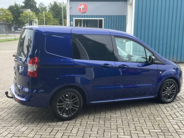 Ford TRANSIT COURIER 1.5 96Pk TDCI Sport / Cruise / Airco / Schuifdeur / Navi / Trekhaak / Lease ¤221,- pm / Apk t/m 20-12-2024