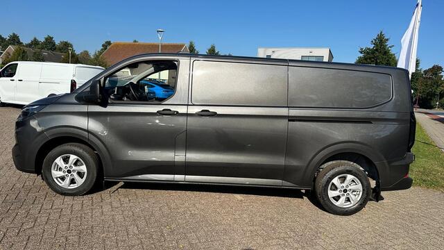 Ford TRANSIT CUSTOM 320 2.0 TDCI L2H1 Trend SCI Automaat 136pk | Adaptive cruise control | Dubbele schuifdeur | 8-weg bestuurderstoel + passagiersstoel | Stoelverwarming | Dodehoeksensoren | Navigatie | Elektrische inklapbare spiegels | 16 inch lichtmetalen velgen | Full LED