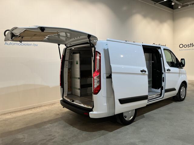 Ford TRANSIT CUSTOM 300 2.0 TDCI L1H1 Trend 130 PK / Servicebus / Bott Inrichting / Euro 6 / Schuifdeur L + R / Airco / CarPlay / Klep / PDC / Navigatie / 3-Zits