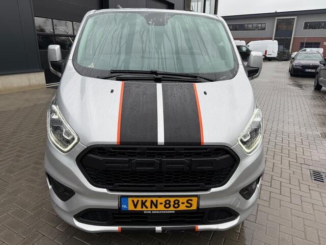 Ford TRANSIT CUSTOM 320 2.0 TDCI L2H1 Sport | Automaat 185pk | Camera | Bi-Xenon | Trekhaak | Stoelverwarming | Betimmering + Vloer | Raptor Grille