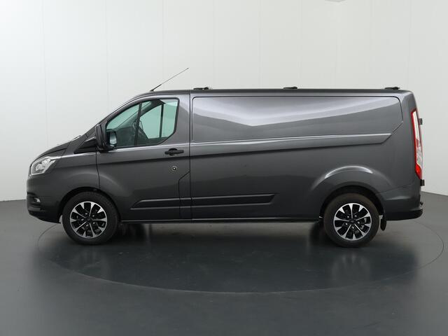 Ford TRANSIT CUSTOM 300 | 2.0 TDCI | Aut. | L2 H1 | Trend | Navigatie | Parkeercamera | Trekhaak | 3-zits | Airco | LM Velgen