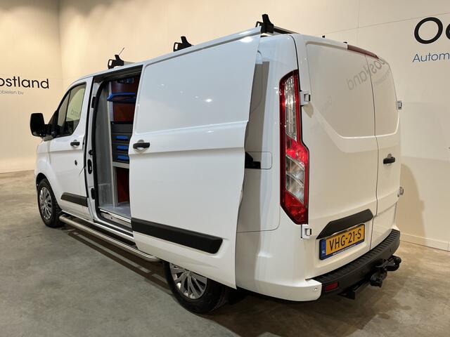 Ford TRANSIT CUSTOM 340 2.0 TDCI L1H1 Trend 130 PK Servicebus / Sortimo Inrichting / Euro 6 / Schuifdeur L + R / 220V. / Airco / Cruise Control / PDC / CarPlay / Trekhaak / Navigatie /