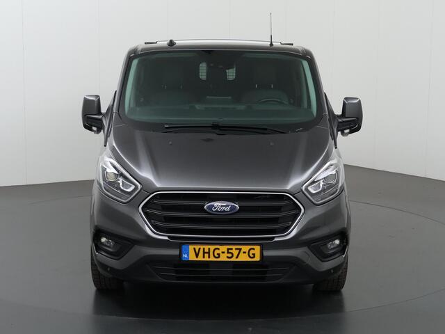 Ford TRANSIT CUSTOM 300 2.0 TDCI Aut. | 170 PK | L2 H1 | DC | LIMITED | LEDEREN BEKLEDING | 2X ZIJSCHUIFDEUR | CAMERA | BLIND-SPOT | NAVIGATIE | STOELVERWARMING | ADAPTIVE CRUISE CONTROL |