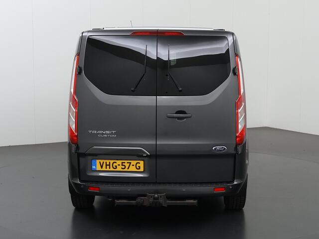 Ford TRANSIT CUSTOM 300 2.0 TDCI Aut. | 170 PK | L2 H1 | DC | LIMITED | LEDEREN BEKLEDING | 2X ZIJSCHUIFDEUR | CAMERA | BLIND-SPOT | NAVIGATIE | STOELVERWARMING | ADAPTIVE CRUISE CONTROL |
