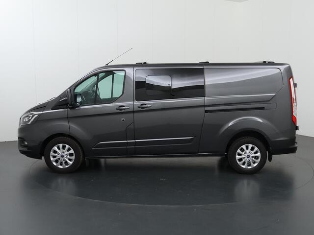 Ford TRANSIT CUSTOM 300 2.0 TDCI Aut. | 170 PK | L2 H1 | DC | LIMITED | LEDEREN BEKLEDING | 2X ZIJSCHUIFDEUR | CAMERA | BLIND-SPOT | NAVIGATIE | STOELVERWARMING | ADAPTIVE CRUISE CONTROL |