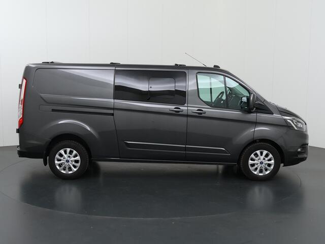 Ford TRANSIT CUSTOM 300 2.0 TDCI Aut. | 170 PK | L2 H1 | DC | LIMITED | LEDEREN BEKLEDING | 2X ZIJSCHUIFDEUR | CAMERA | BLIND-SPOT | NAVIGATIE | STOELVERWARMING | ADAPTIVE CRUISE CONTROL |