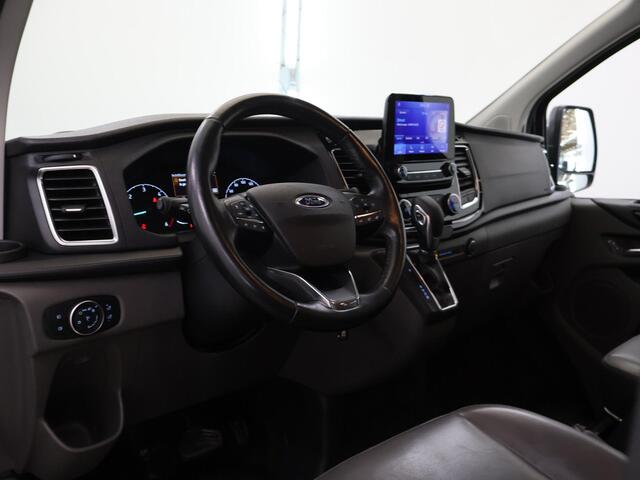 Ford TRANSIT CUSTOM 300 2.0 TDCI Aut. | 170 PK | L2 H1 | DC | LIMITED | LEDEREN BEKLEDING | 2X ZIJSCHUIFDEUR | CAMERA | BLIND-SPOT | NAVIGATIE | STOELVERWARMING | ADAPTIVE CRUISE CONTROL |