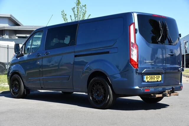 Ford TRANSIT CUSTOM 300 2.0 TDCI L2H1 Limited DC Camera, Cruise, Carplay, 170PK, Trekhaak, Stoelverwarming, Automaat, 2 x Schuifdeur, Uniek!
